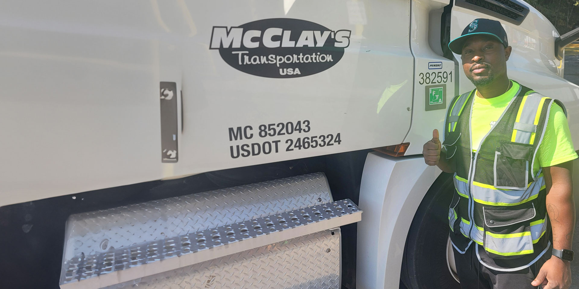 A McClay's truck driver giving the thumbs-up