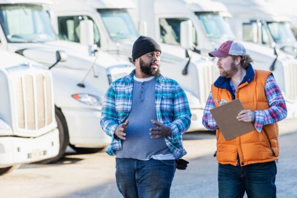 A trucker and dispatcher discuss a load